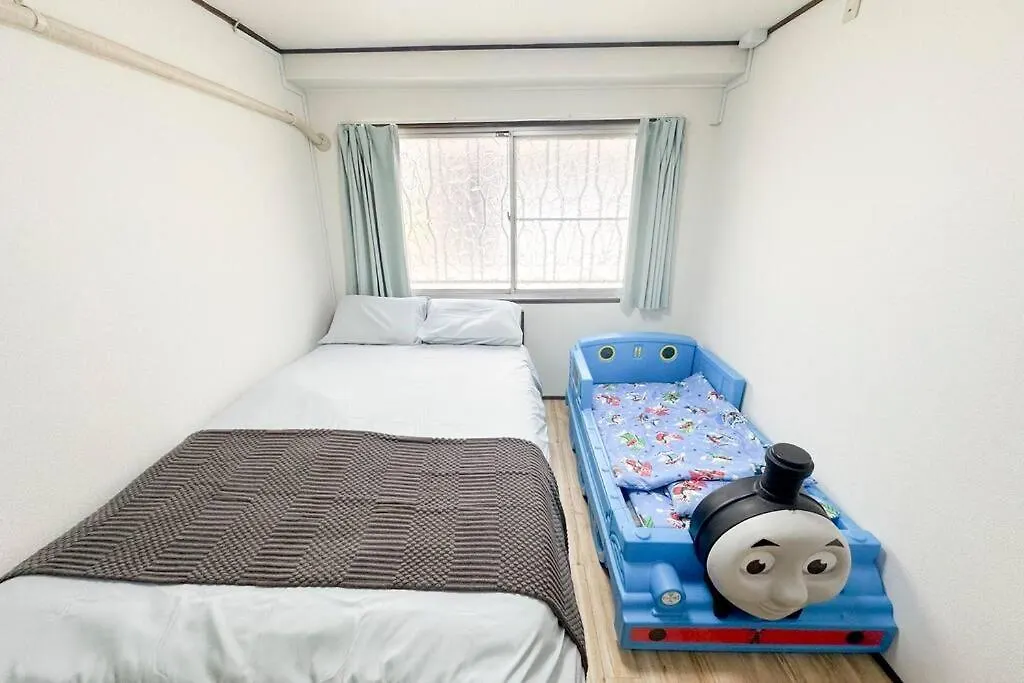 大正 Guest House! Usjと心斎橋へアクセス抜群!京セラドーム近くの大正駅徒歩5分!12人宿泊可能!一軒家貸切! Osaka